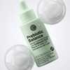 Prebiotic Balance serum bottle with dropper on a light gray background